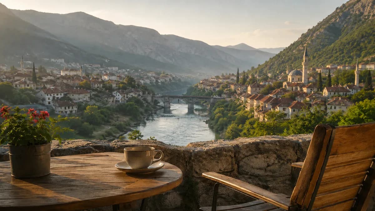 Terrace overlooking a river and historic town in Herzegovina
