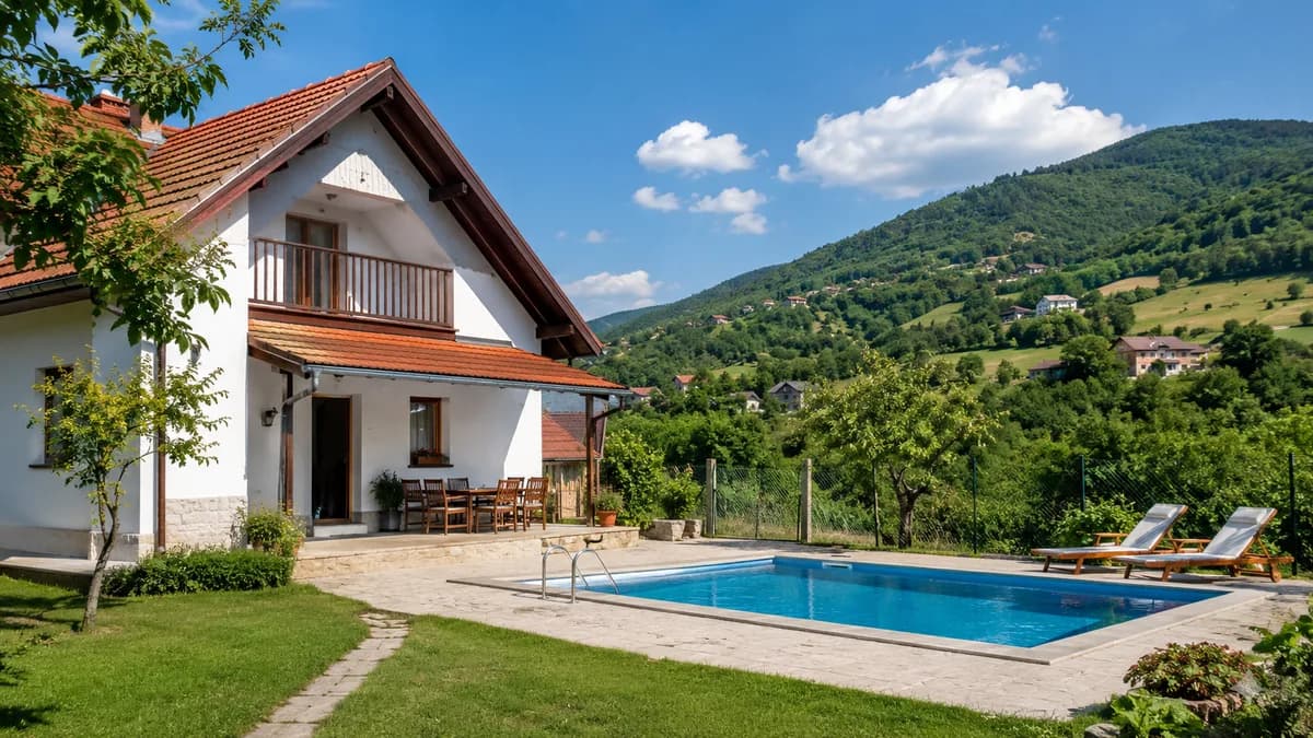 Summer pool villa among green hills